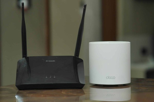 What are the steps to configure a dual-band Wi-Fi network using a TP-Link Archer AX6000 router?
